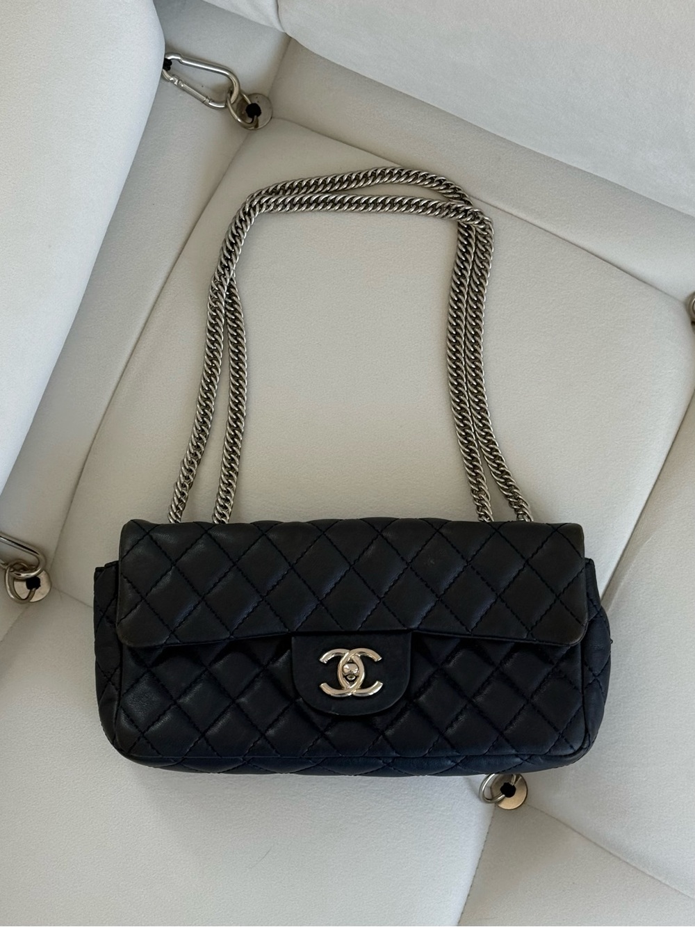 CHANEL Black Quilted Shoulder Bag with Silver Hardware